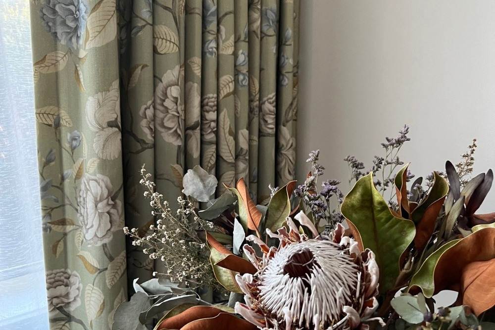 Close-up of a floral curtain fabric, showcasing quality and style from Designing Windows for Bowning and Binalong customers